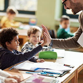 Stock photo of teacher and student.