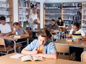Stock photo of students in classroom.